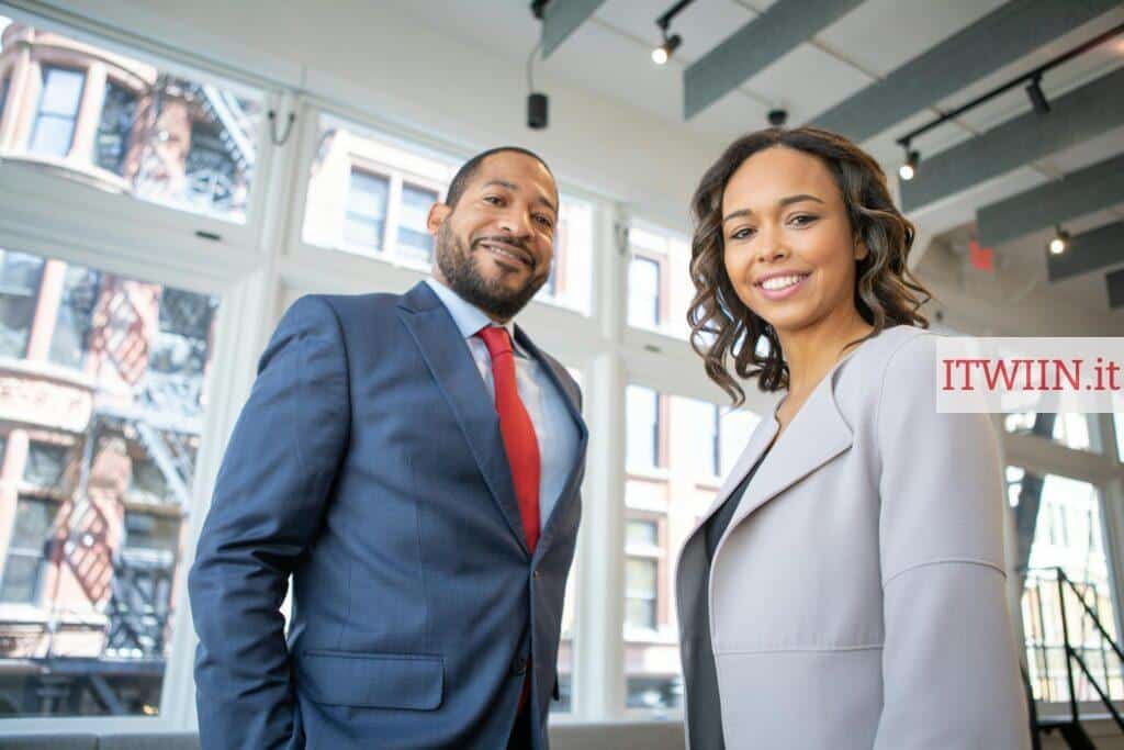 Man and Woman Smiling Inside Building