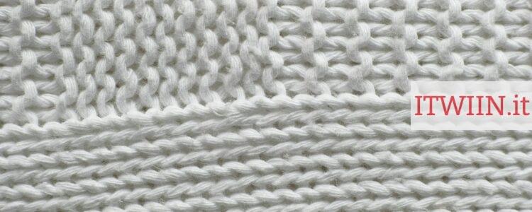 white knit textile on white surface