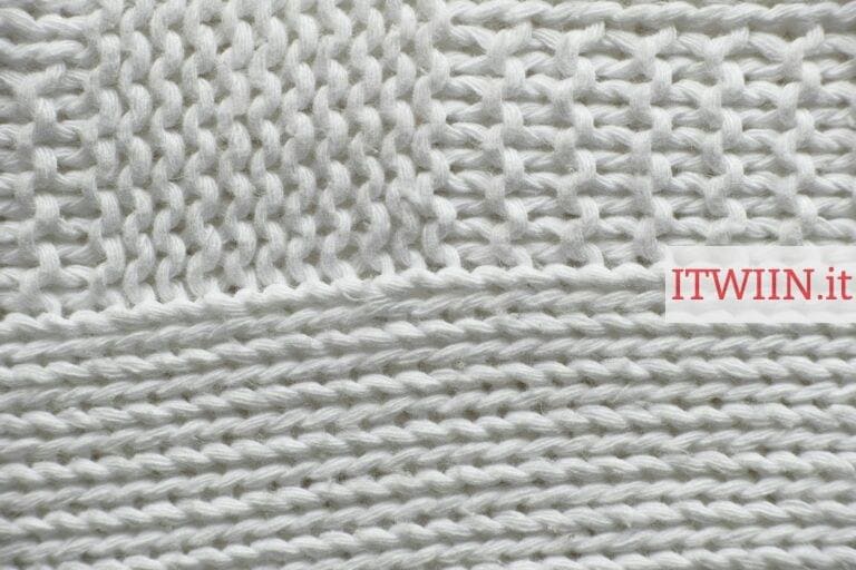 white knit textile on white surface