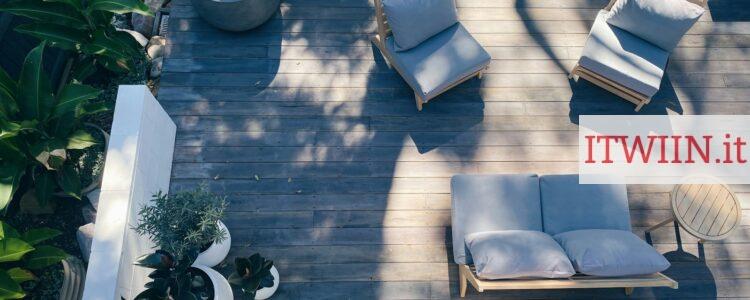 brown wooden framed blue padded armchair