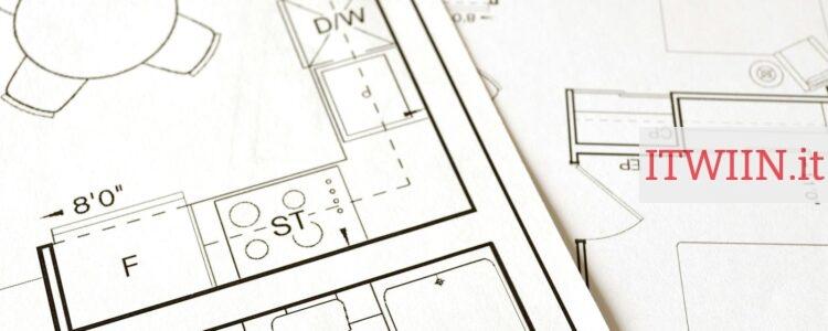Close-up view of an architectural floor plan on paper showcasing detailed room layouts and measurements.