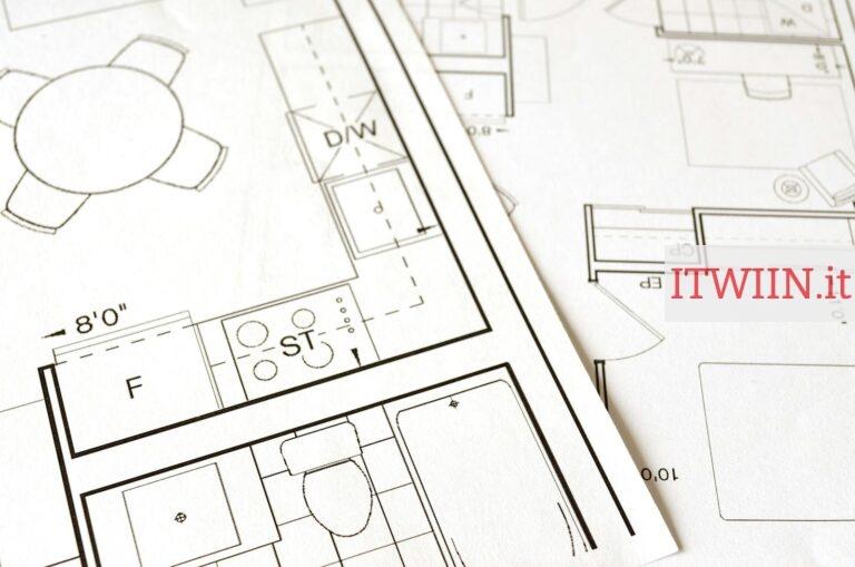 Close-up view of an architectural floor plan on paper showcasing detailed room layouts and measurements.